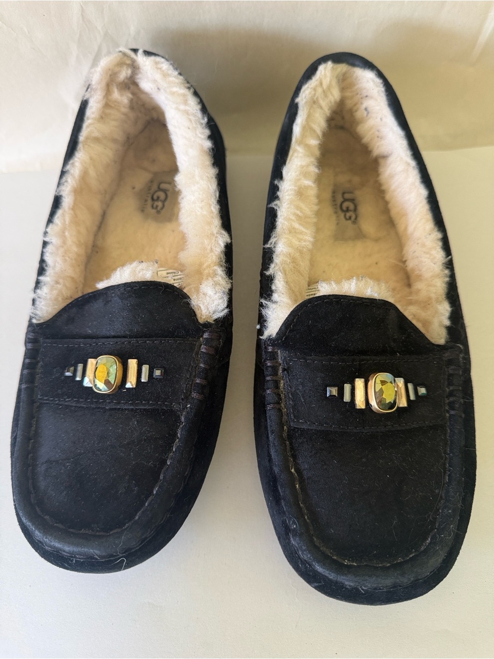 UGG Black Suede Moccasin Slippers with Cream Shearling Swaraski Embellishment